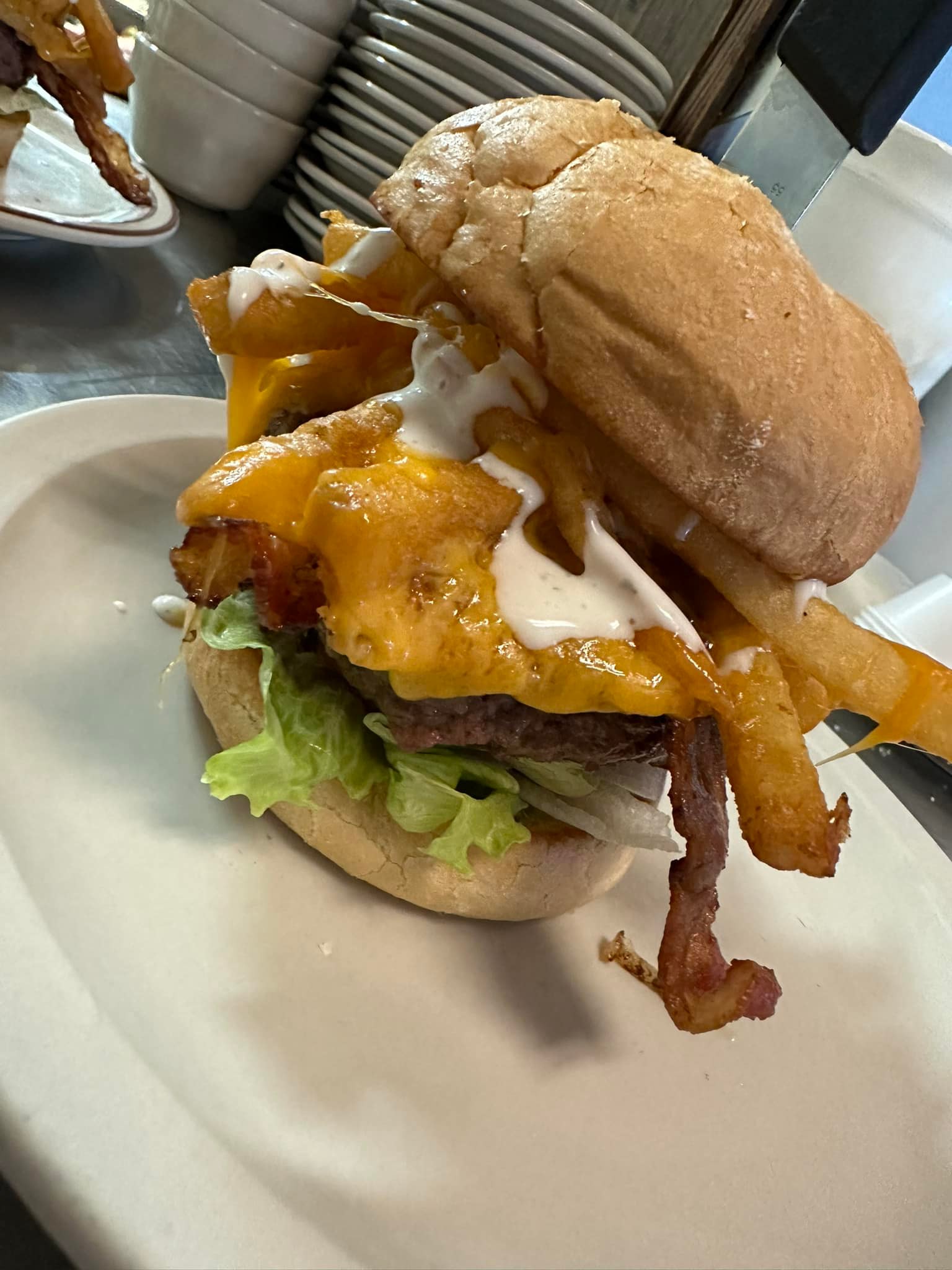 Guest photo of a bacon burger at Sharon’s Homestyle Cookin’