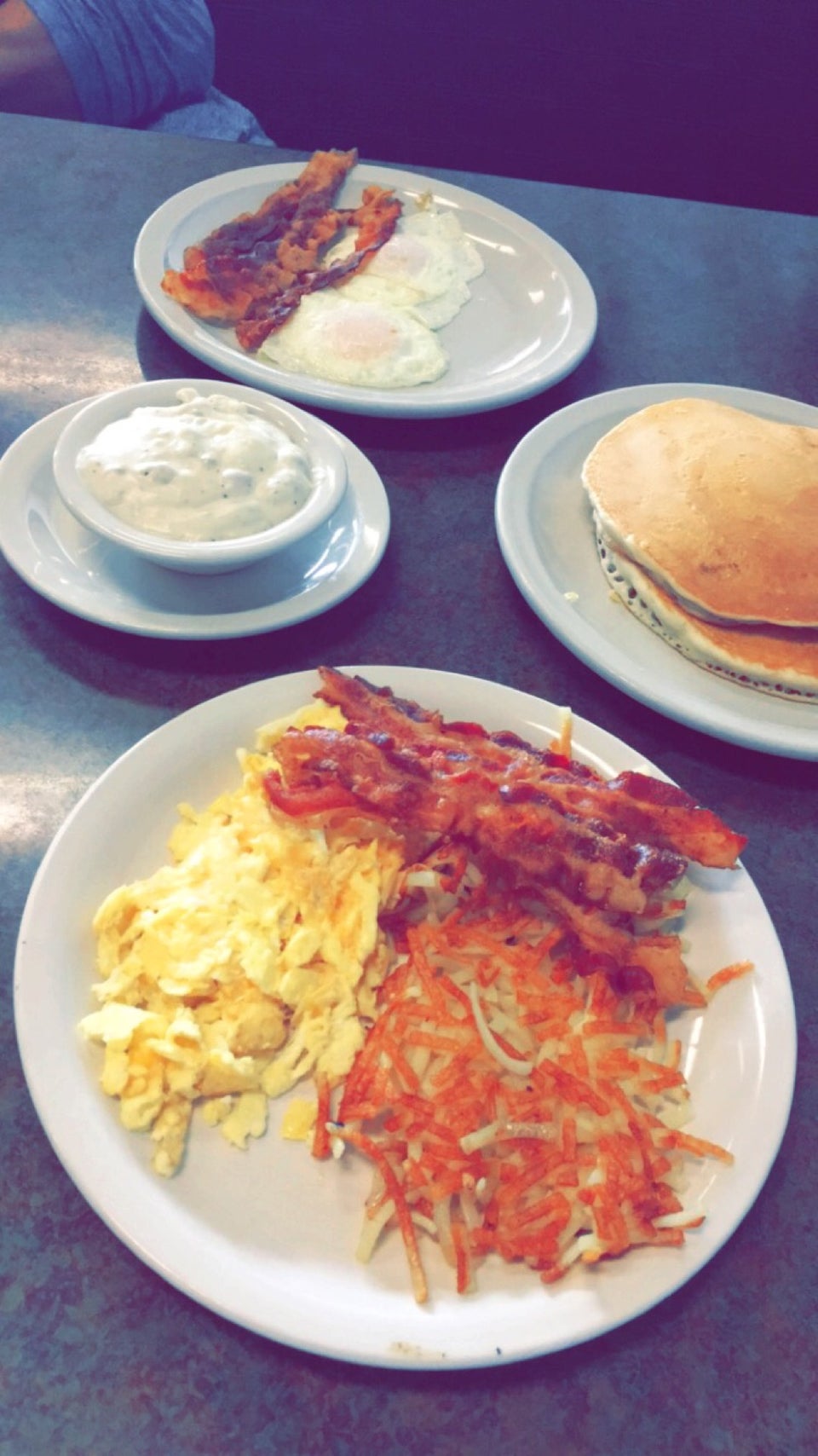 Guest photo of eggs, bacon, hash browns, pancakes, and biscuits and gravy