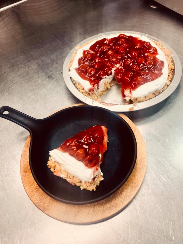 Guest photo of cheesecake with strawberry topping